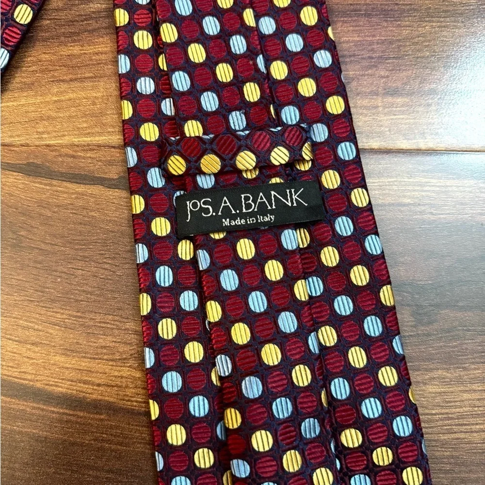 JOS. A BANK Burgundy and Gold Geometric Patterned Silk Tie Made In Italy
